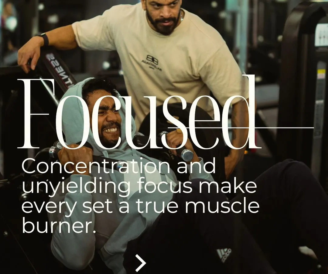 I focus on making every set count. Here, I'm guiding a client through a leg isolation exercise, ensuring they maintain concentration and form to maximize muscle activation and prevent injury.