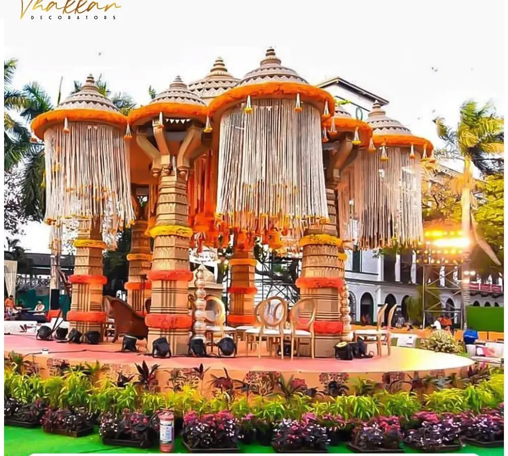 For a truly grand wedding, I constructed this larger than life mandap. The design features massive pillars, intricate canopies, and traditional marigold flower work to create a sense of royal splendor for the main ceremony.