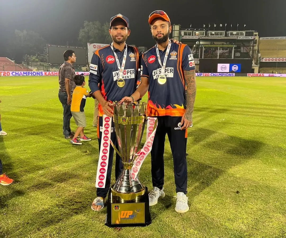 This is what dedication looks like. We are incredibly proud of our student Karan Sharma, captain of Kashi Rudras, holding the UP T20 trophy. His success is a testament to the hard work we value.