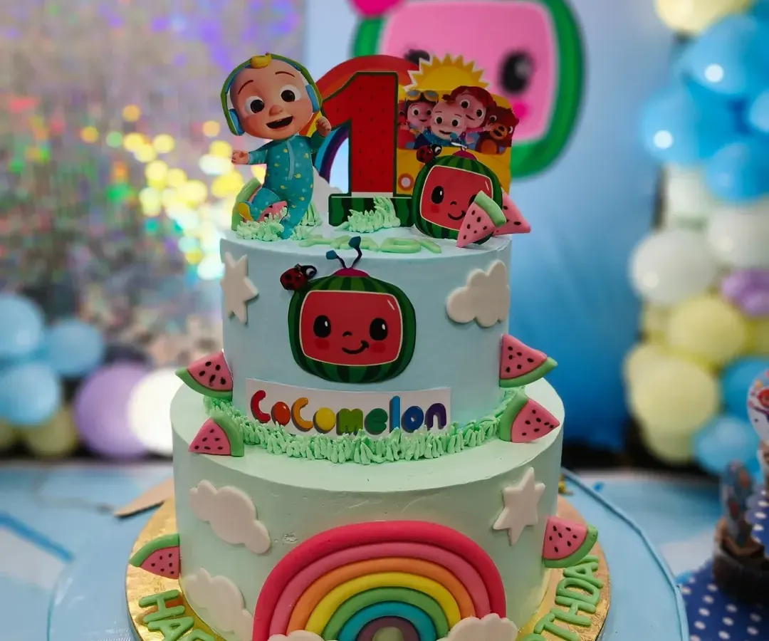 I had so much fun creating this two-tier Cocomelon themed cake for a first birthday party. It features a fondant rainbow, watermelon details, and all the beloved characters. I can work with your event planner to make sure the cake perfectly matches your party's decor.