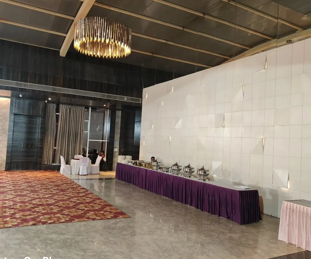 This is a full buffet line we set up for a large party in a modern banquet hall. We can handle catering for upscale events, ensuring the food station is arranged neatly and professionally to match the elegant venue.