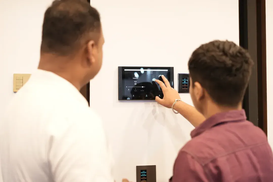 Experience technology firsthand. We provide countless opportunities for you to interact with the newest smart home products, like this intuitive wall-mounted control panel, allowing for a tactile and practical evaluation of the tech that will shape future homes.