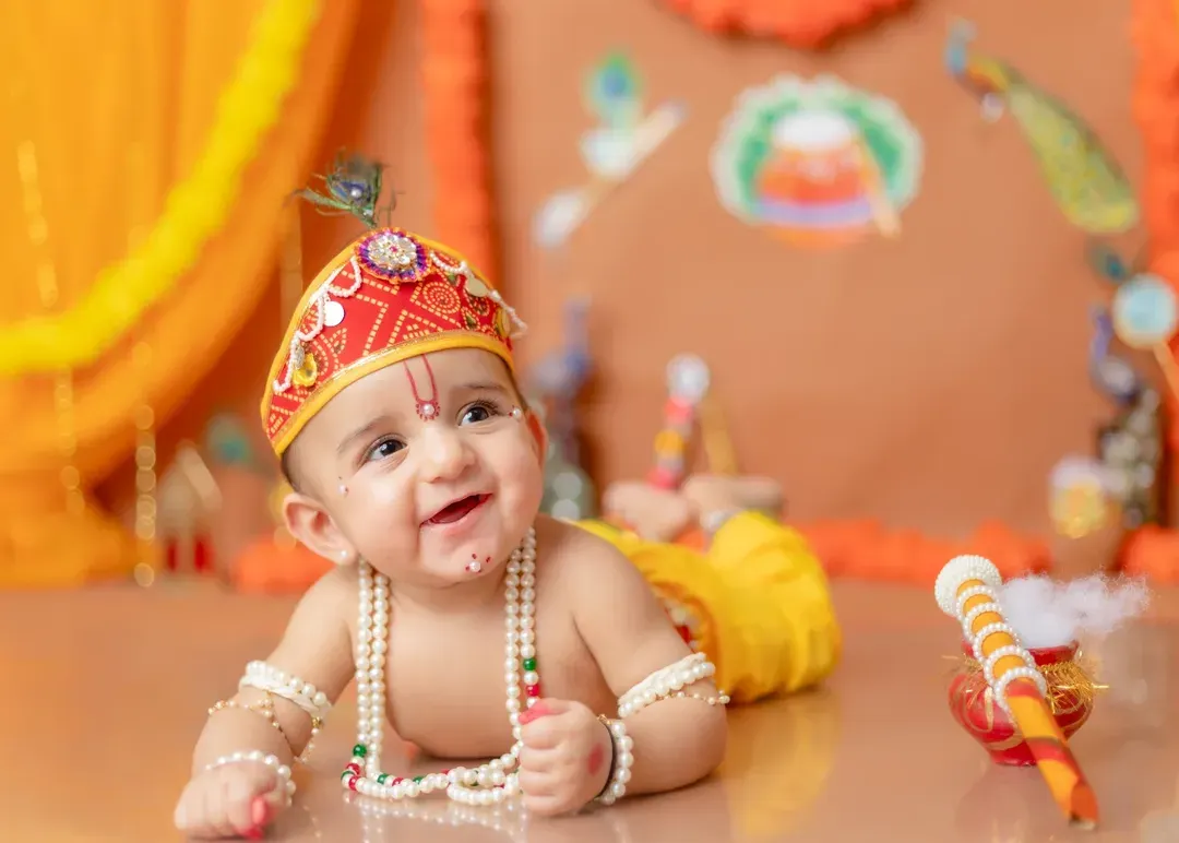 The sparkle in his eyes says it all! My Little Krishna themed shoots are a special way to celebrate our culture. I take care of all the details, from the costume to the set, to create a truly divine portrait of your little Kanha.