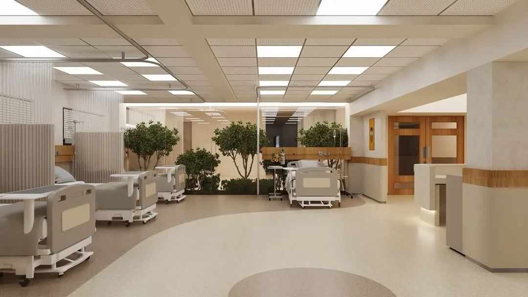 This is our biophilic design philosophy in action within an ICU. We incorporated a central green courtyard, visible through large glass panels, to bring the calming presence of nature directly into the recovery space, reducing patient stress and creating a more hopeful environment.