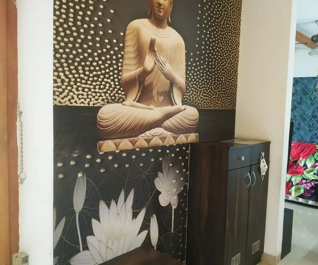 A serene, custom-designed Buddha mural installed in an entryway. This type of spiritual wallpaper adds a sense of peace and personalization to your home.