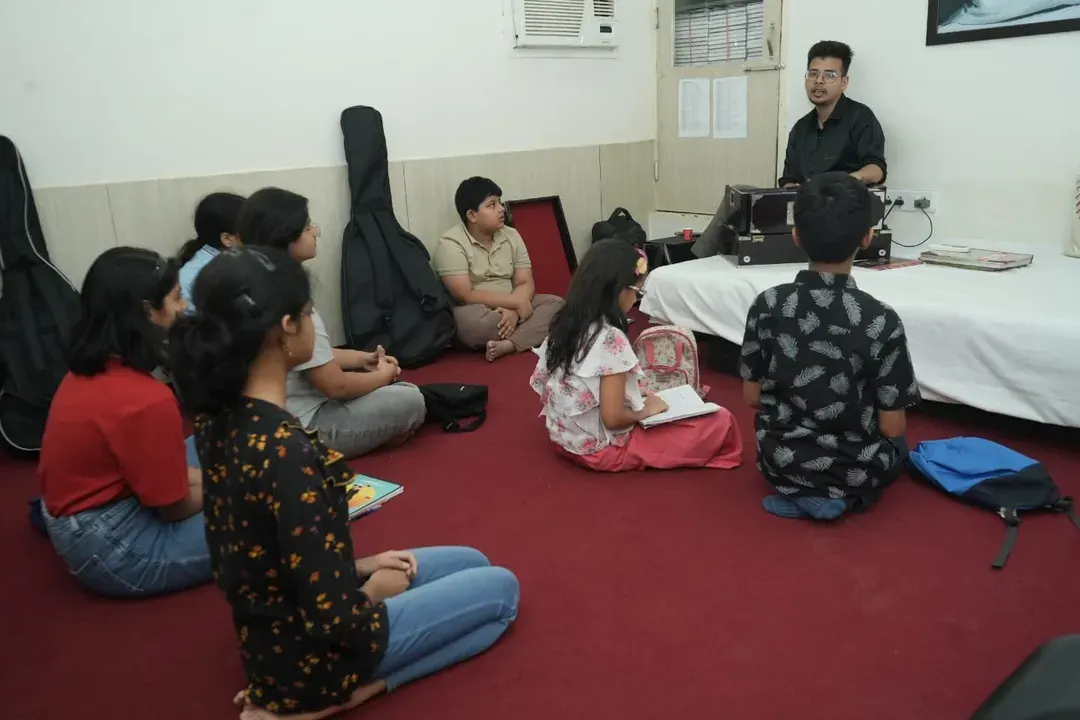This is where the magic begins. A glimpse into one of our vocal music classes in Gurgaon, where students are deeply engaged in learning the fundamentals of music theory and practice in a supportive group setting.
