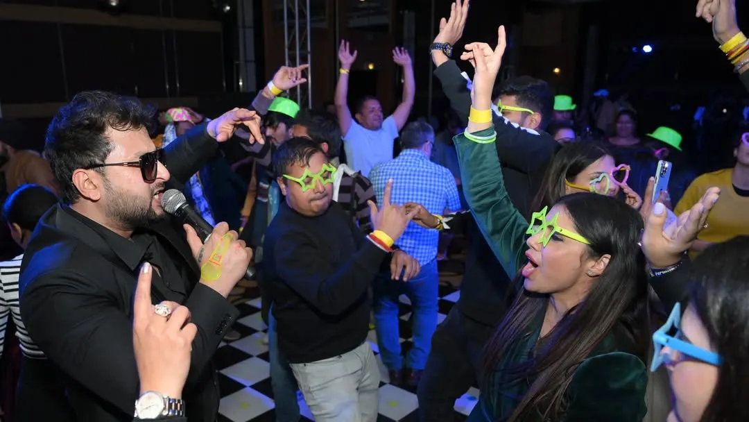 Capturing the pure, uninhibited energy of the crowd at a New Year's Eve party in Jaipur. My event photography focuses on these real, high-energy moments on the dance floor.