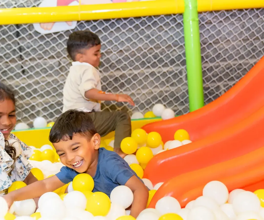 This is the kind of pure, unfiltered joy we love to see. Our ball pit is more than just a play area; it's a space for laughter, making new friends, and developing social skills through fun.