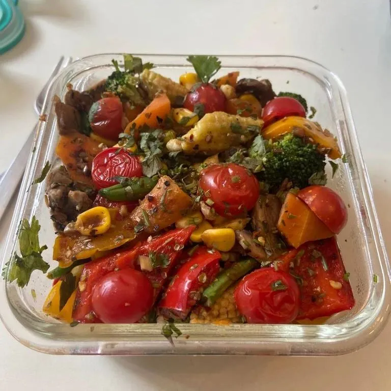 Who said diet food has to be dull? Our warm roasted vegetable salad is packed with flavor, featuring roasted broccoli, cherry tomatoes, baby corn, and bell peppers for a satisfying and nutritious meal.