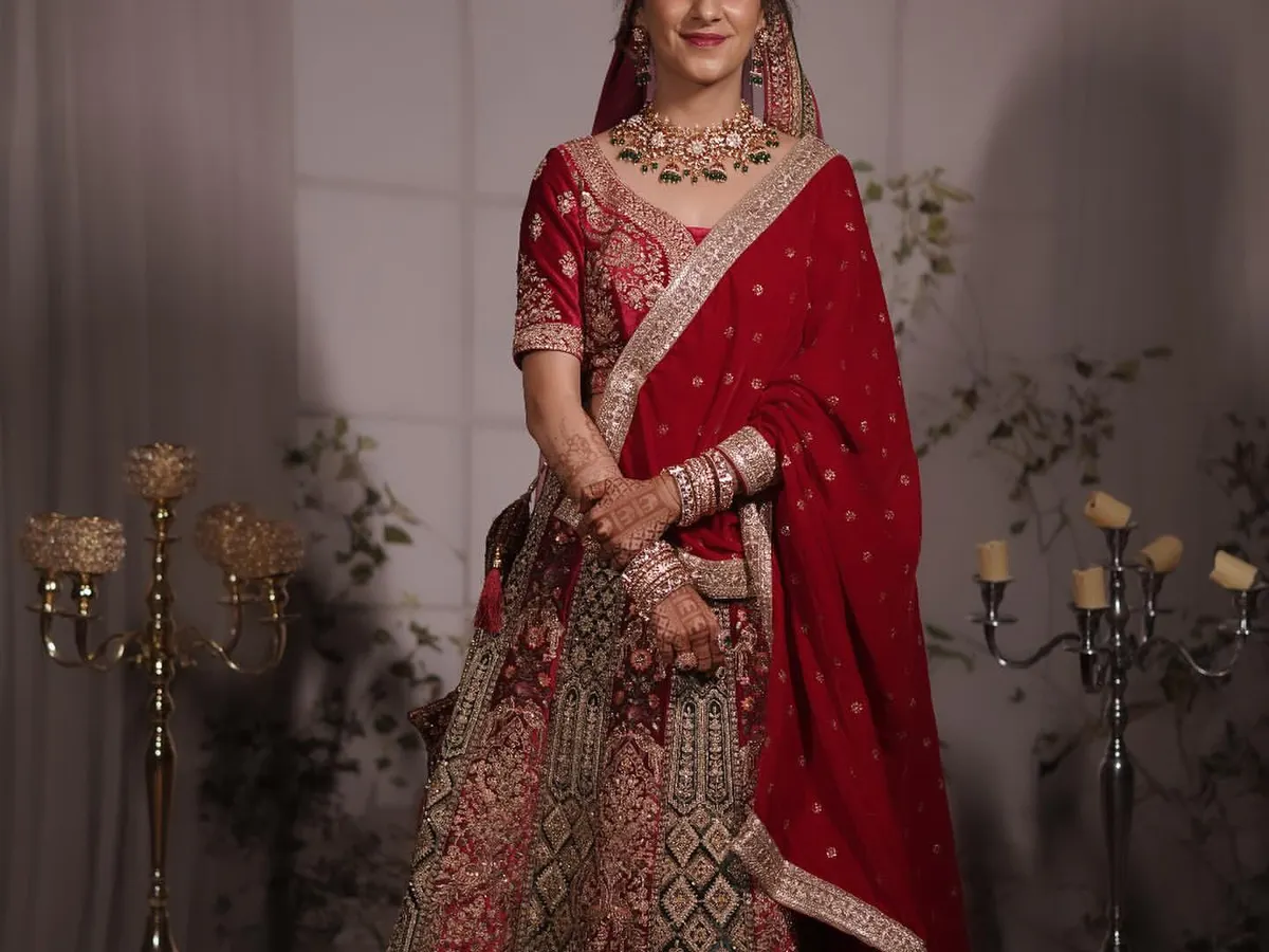 This is the quintessential North Indian bridal look. For this reception, I created a classic brown smokey eye with a hint of shimmer, paired with a bold lip, to complement her magnificent red lehenga. The entire look is designed to be glamorous, timeless, and absolutely stunning in photos.