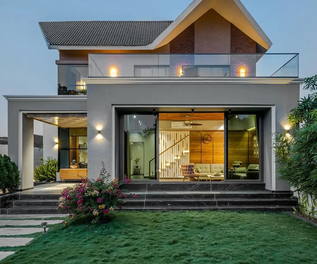 Our "Tranquil Mango Haven" project embodies our approach to private estates. The architecture and landscape are designed as one, with the home opening directly onto manicured lawns and natural greenery, creating a seamless transition between indoor and outdoor living.