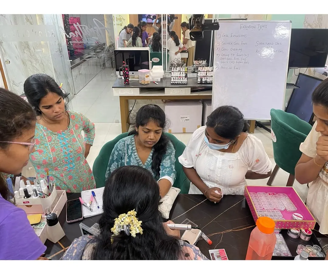 A glimpse into our hands-on professional nail art course. I believe in close supervision, ensuring every student gets the personal attention needed to master techniques like acrylic application and drilling.