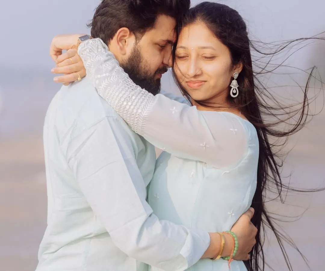 A quiet, windswept moment during a pre-wedding shoot on the beach. I focus on creating a comfortable space where couples can be themselves, resulting in genuine and emotional portraits like this.