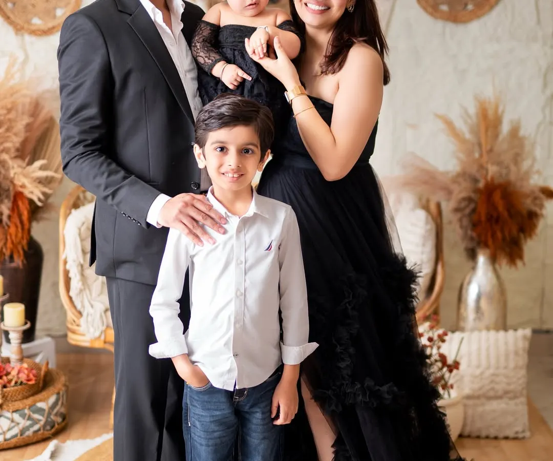 A beautiful, classic family portrait is a timeless treasure. I love bringing everyone together, including parents and siblings, to create an image that will be cherished for generations.