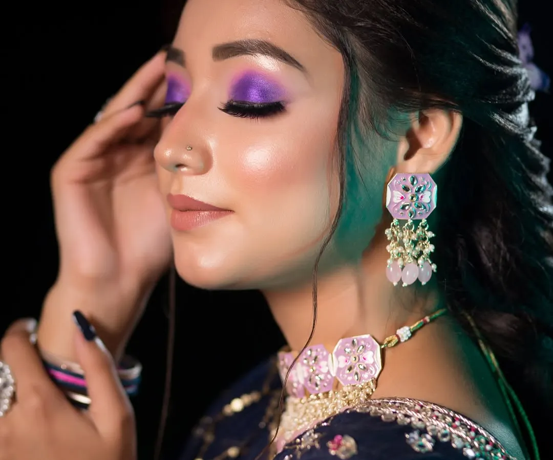 You will also learn to play with color and create bold, glamorous looks like this. This vibrant purple eye makeup is perfect for a reception or sangeet, and I cover these advanced techniques in my diploma course.