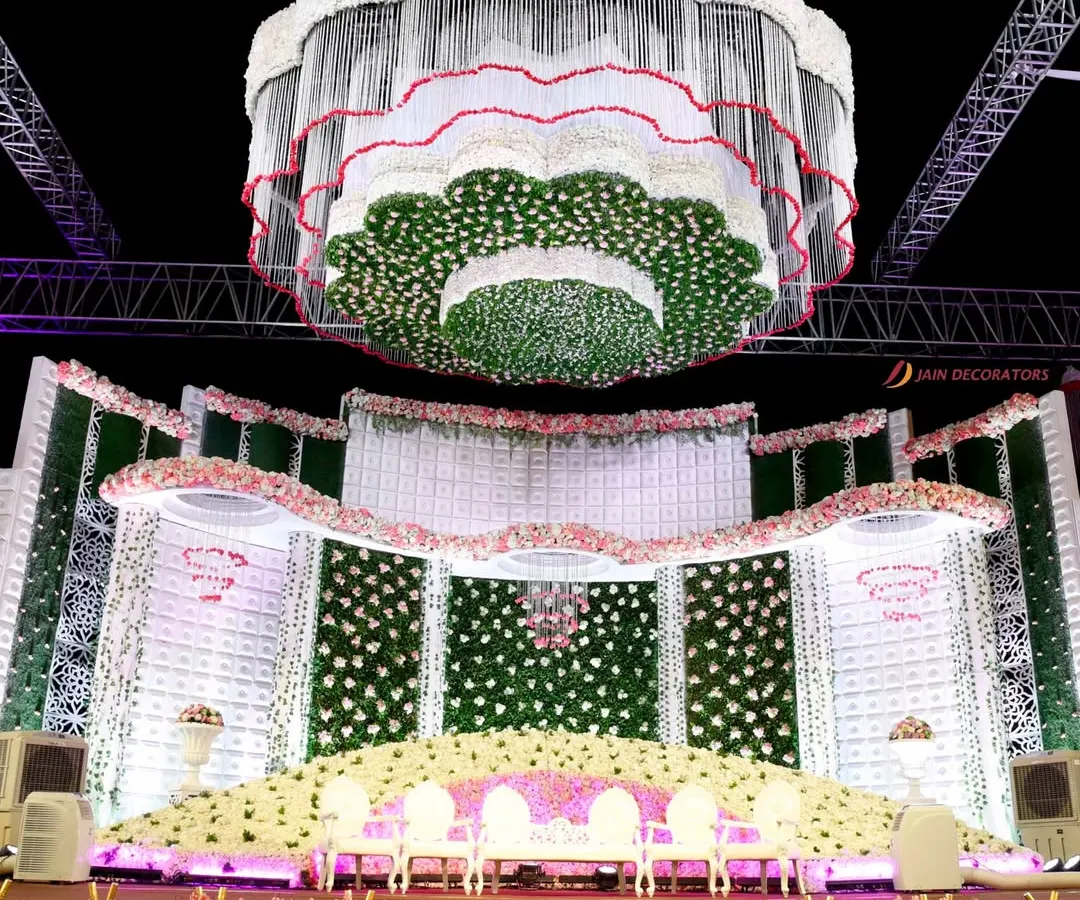 I believe in creating moments that leave everyone speechless. This magnificent, multi-tiered floral chandelier was the centerpiece of a grand reception, transforming the entire venue into a breathtaking spectacle of light and blossoms.