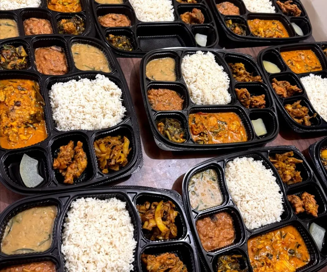 Here are my multi-compartment thalis, packed and ready for a 'Cheiraoba' festival order. Each thali offers a complete meal with rice, curries, and sides, ensuring every guest gets a perfect portion.