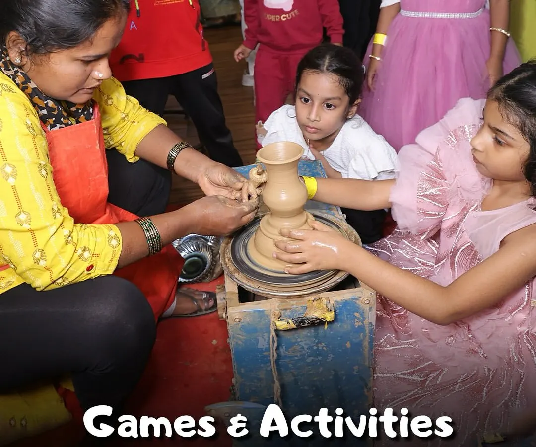 A close-up of our popular pottery workshop where a child learns to use a potter's wheel with guidance from an instructor. We believe in letting kids get their hands dirty to create something beautiful.