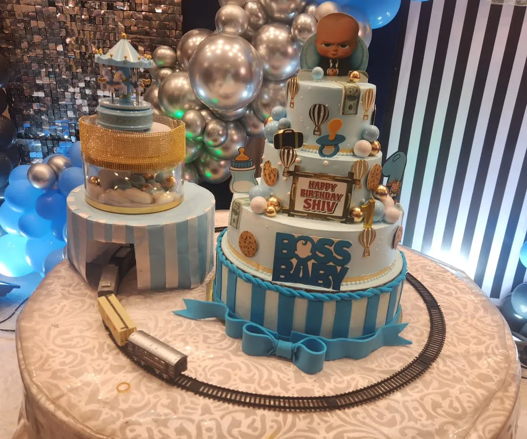 This grand, three-tiered Boss Baby theme cake is a perfect example of how I bring big party themes to life. Complete with a miniature train track and detailed fondant characters, it's designed to be the showstopper at any large celebration.