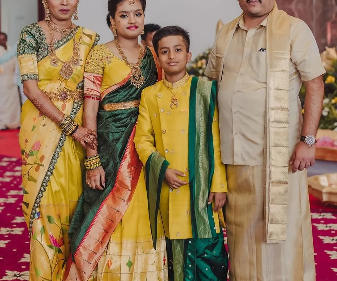 Another beautiful family portrait, this time in a vibrant yellow and green palette. I designed these coordinated outfits for a wedding, ensuring everyone from the parents to the children felt connected and stylish in their custom ethnic wear.