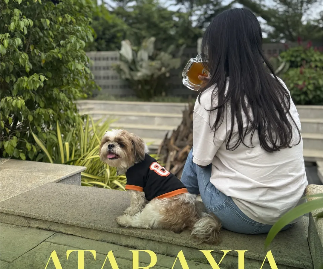 Find your moment of calm. Here, you can enjoy a quiet drink and unwind with your furry co-worker by your side. It's the perfect way to balance work and relaxation.