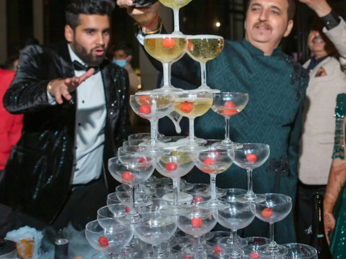 Nothing says celebration like a classic champagne tower. We build these magnificent structures, complete with dramatic dry ice effects, creating a perfect, timeless moment for weddings, anniversaries, and milestone events.