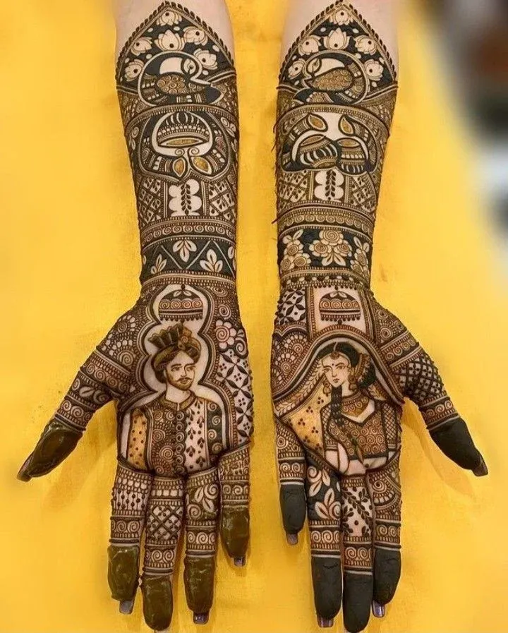 My specialty is creating lifelike bride and groom portraits. This design shows a detailed groom portrait on one palm and the bride on the other, framed by intricate patterns and peacock motifs on the arms. I focus on getting the expressions and features just right. (Also shown in images 20 and 25).