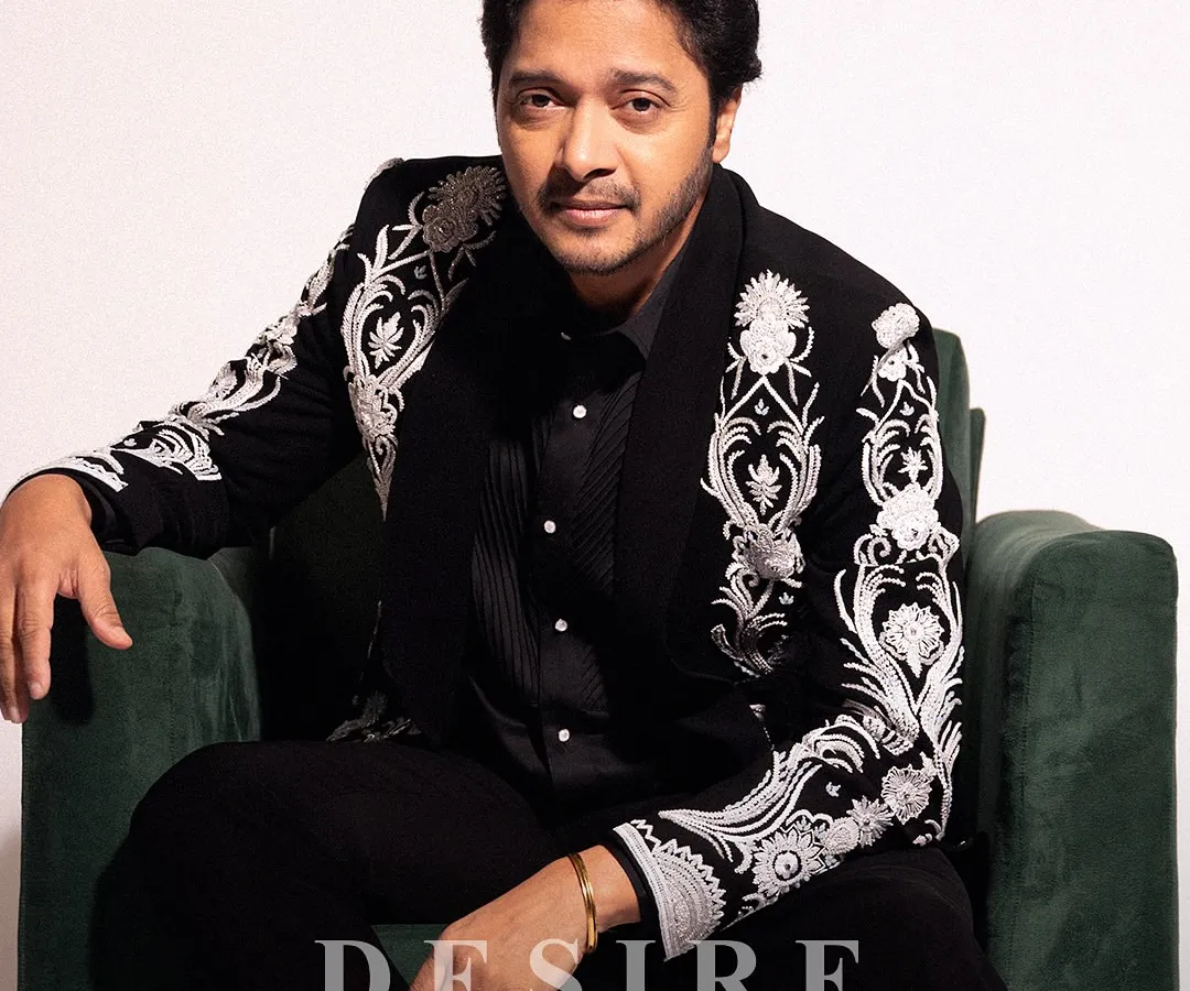 Confidence, tailored. Here, actor Shreyas Talpade wears a bespoke ceremonial jacket I designed. The sharp, modern fit is contrasted with powerful white embroidery on a classic black base, creating a look of pure, unapologetic elegance.