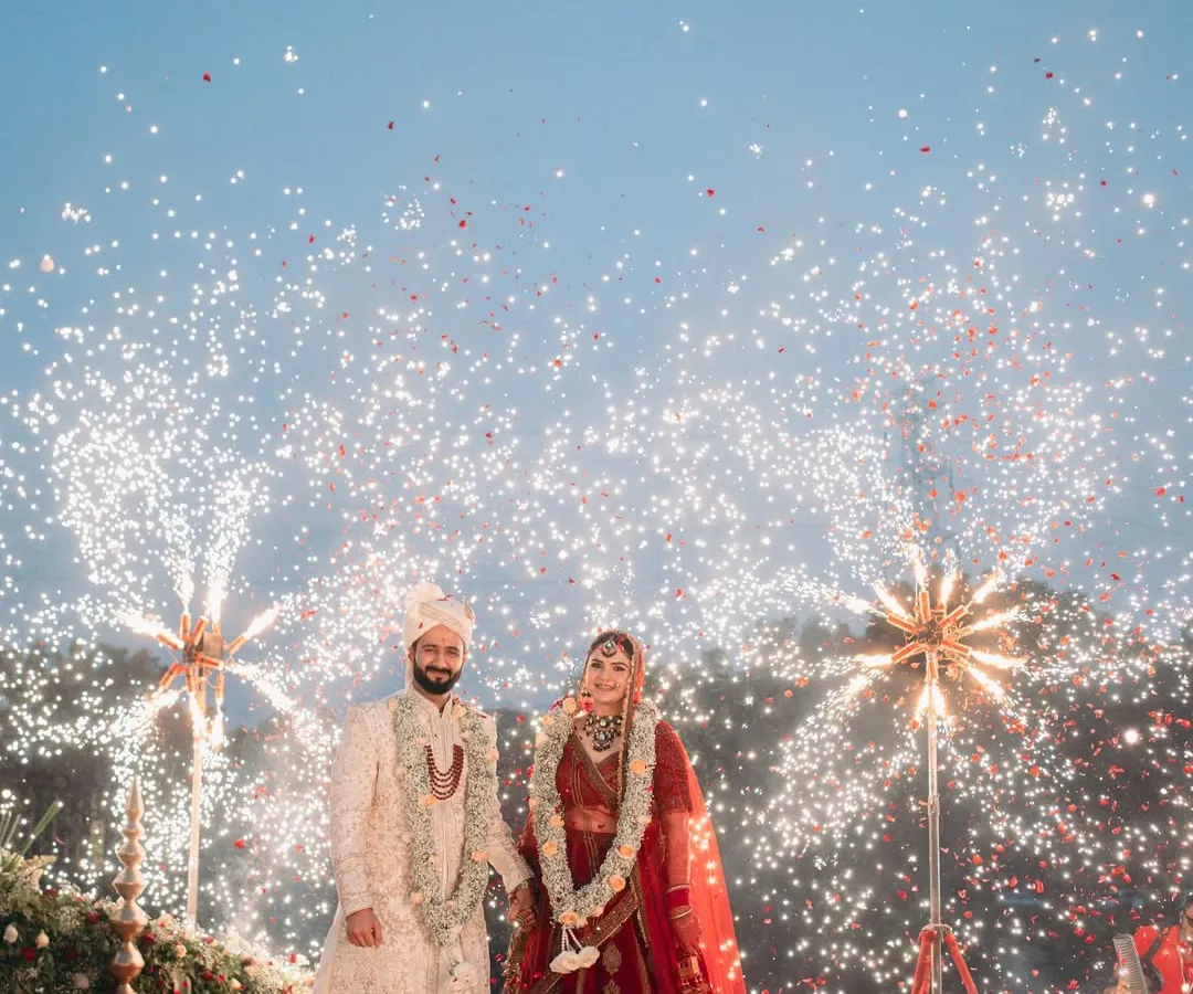 A Varmala moment that lights up the sky. We believe the big moments should feel larger than life, and for this couple at Oleander Farms, we made sure their union was celebrated with a spectacular firework display.