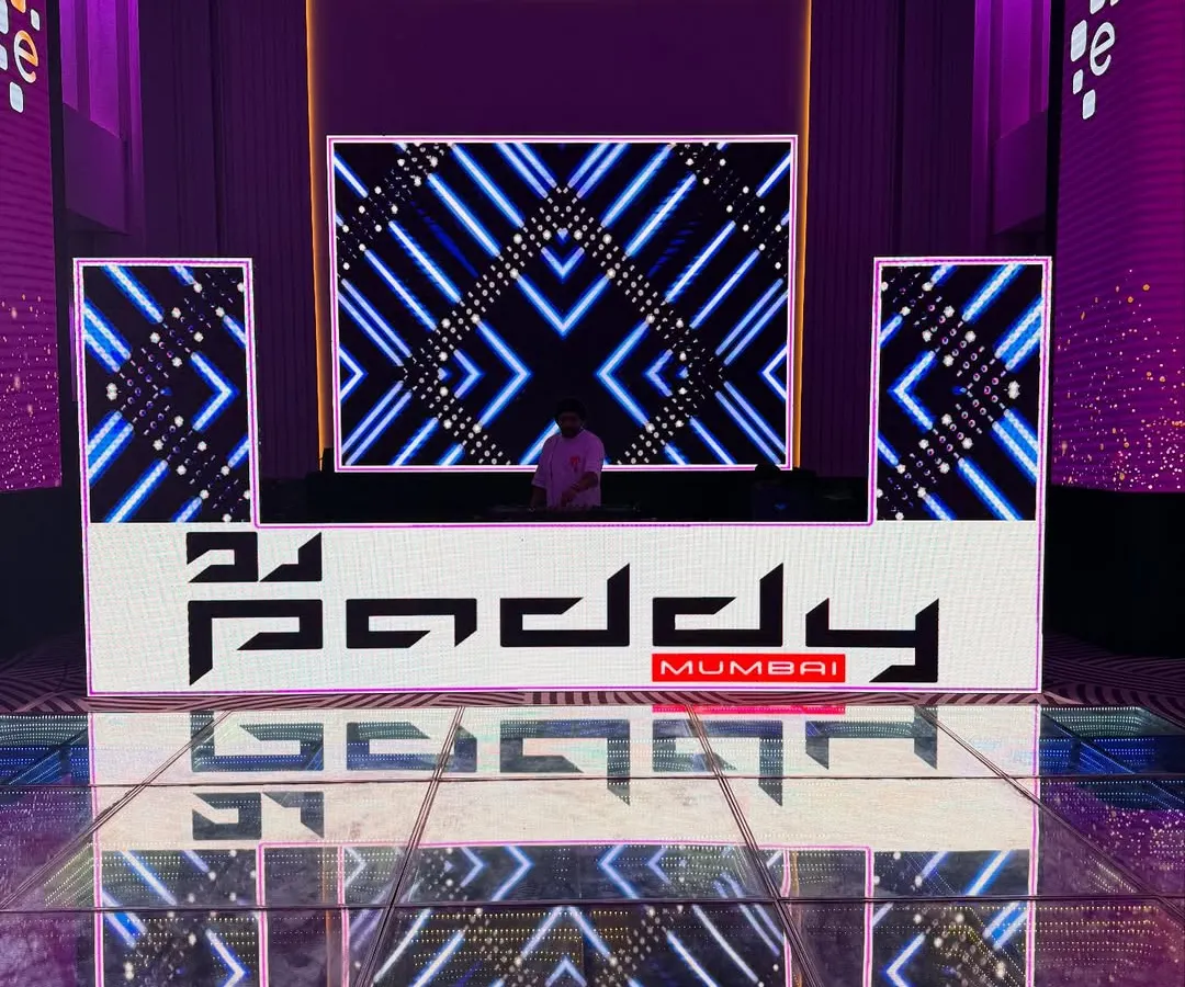 My professional setup is ready to rock your corporate event. I bring a custom branded DJ booth, massive LED screens, and an infinity LED dance floor to make your party look as good as it sounds.