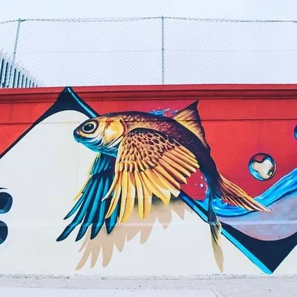 This custom mural of a surreal winged fish demonstrates my artistic capabilities for unique wall art. I can paint detailed, imaginative designs for both residential and commercial clients.