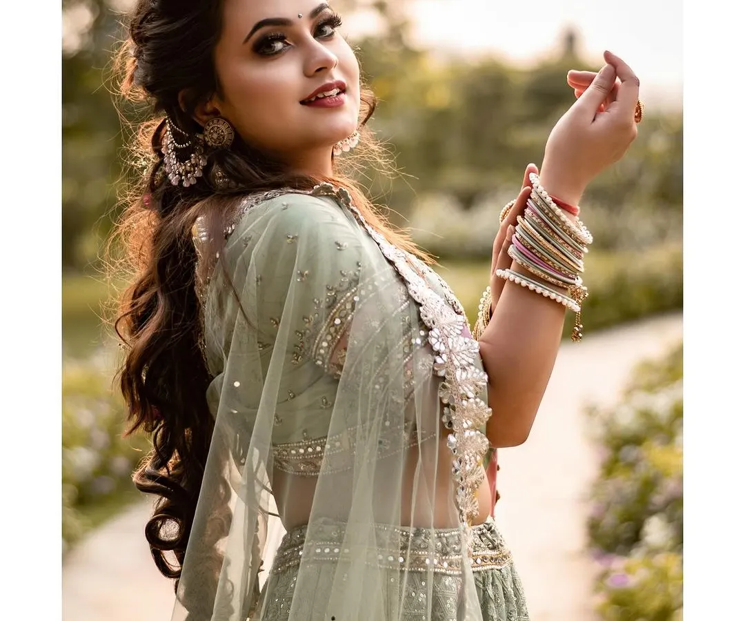 A portrait is a story, and this one is full of joy and grace. We were shooting outdoors, and her smile lit up the entire frame. It shows how a beautiful traditional lehenga can shine in natural light.