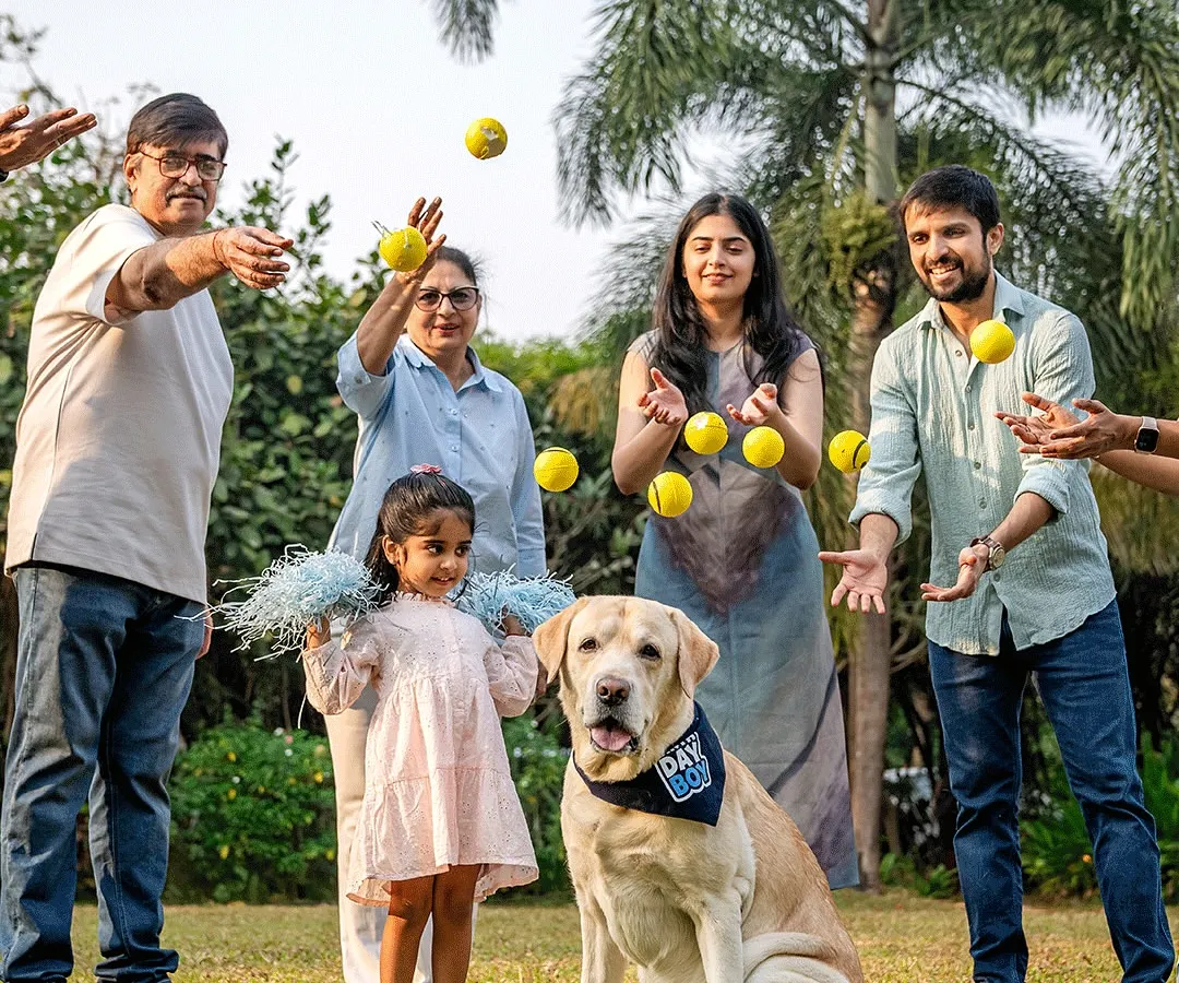 A perfect storm of flying tennis balls and laughter for Spike's 10th birthday! This is what pure family joy looks like. We don't do stiff poses, we create moments of fun that result in memories like this.