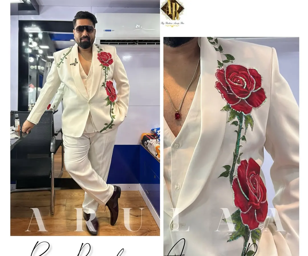 For director Tharun Sudhir's appearance on the 'Mahanati' TV show, we went with a 'Love & Romance' theme. I designed this custom white three-piece suit and then we hand-painted red roses directly onto the fabric, creating a truly one-of-a-kind piece of wearable art.