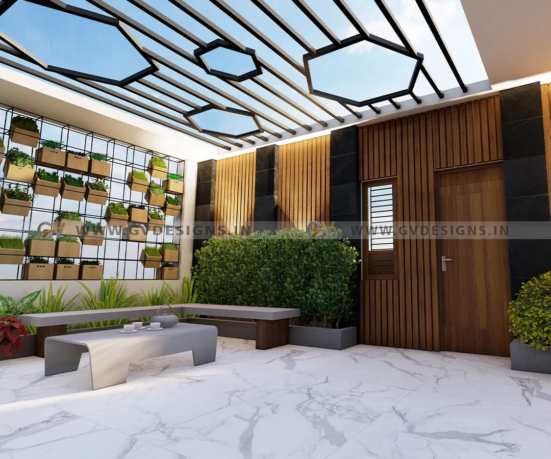 We love bringing modern architectural elements outdoors. This terrace design features a striking geometric metal pergola that creates a unique play of light and shadow. A large vertical garden wall serves as a living art piece, complemented by sleek, built-in concrete seating and lush hedge planters, all set against elegant marble-finish flooring.