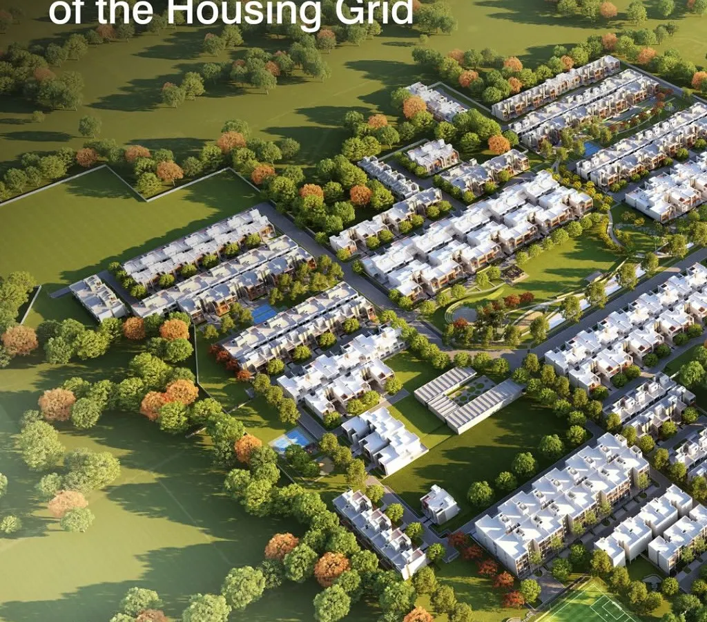 We see large-scale housing not as a grid of repeating units, but as a living community. This aerial view shows our approach to breaking monotony with staggered plots and varied housing types, creating a more human and navigable neighborhood.