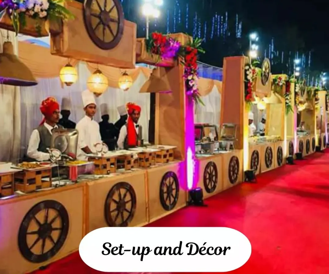 I love creating a full 'Shaadi waala' experience, and this grand buffet setup is a perfect example. We designed the counters with traditional cart-wheel themes and lighting to match the event's decor, ensuring the food presentation was as memorable as the taste.