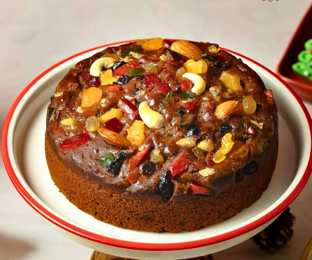 My traditional Christmas plum cake is a festive icon. It's rich, moist, and loaded with premium dry fruits and nuts, capturing the warm, nostalgic taste of the holidays in every single bite.