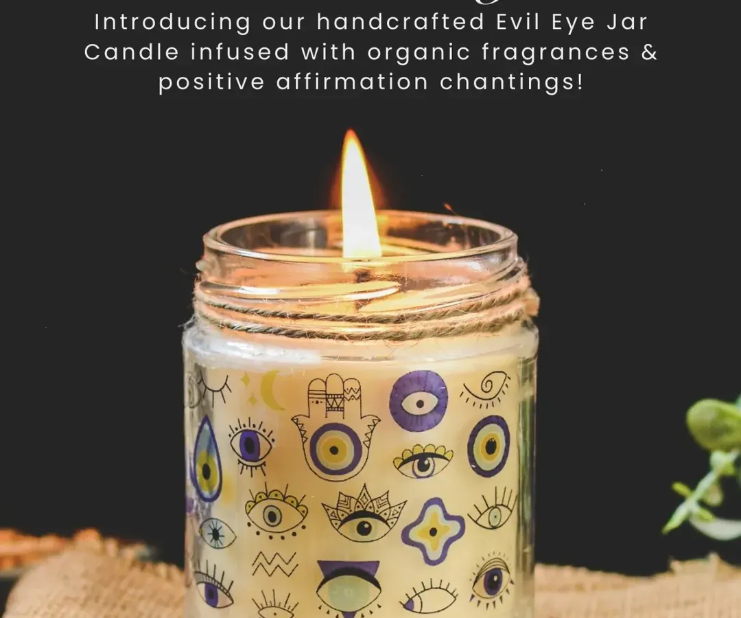 Here is our handcrafted Evil Eye Jar Candle, designed to be a guardian of good vibes for your space. Made with organic beeswax and infused with protective affirmations, it’s the perfect blend of elegance, tranquility, and positive energy.