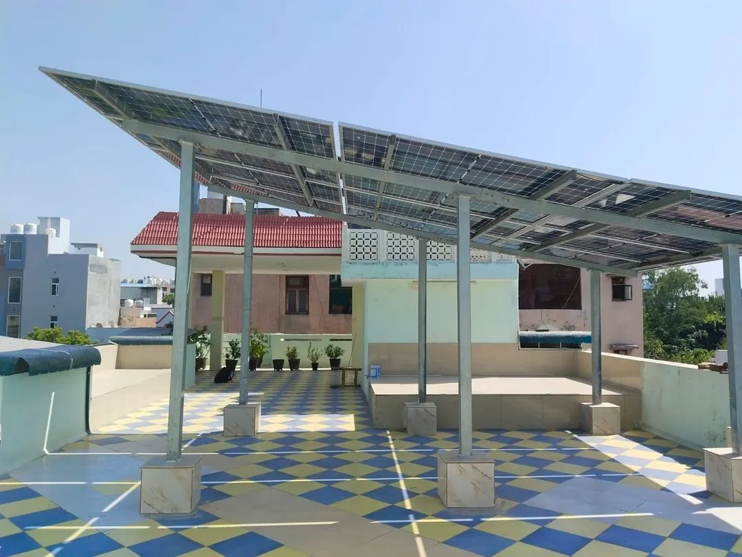 This 10 KW residential On-Grid solar project in West Delhi features an elevated mounting structure. This design preserves the rooftop area for other uses while ensuring the solar panels receive maximum sun exposure for optimal energy generation.