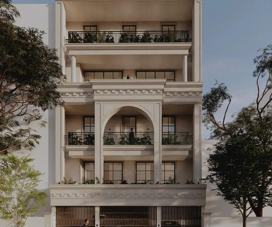 For a duplex residence in Delhi, we designed a stately neo-classical elevation using Dholpur stone. The design is rooted in a shared language of symmetry and proportion, creating a timeless presence for two brothers within a single, harmonious structure.