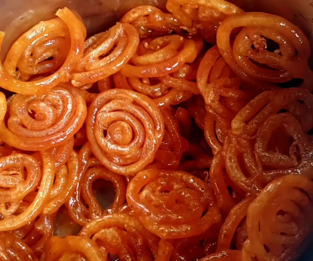 Freshly made, crispy jalebis soaked in sweet syrup. This is one of our most requested sweets for festivals and special occasions, guaranteed to be a crowd-pleaser.