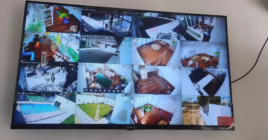 Here is a 16-camera grid view from a large residential installation. I can set up your system so you can see every corner of your property on a single screen, ensuring complete surveillance coverage.