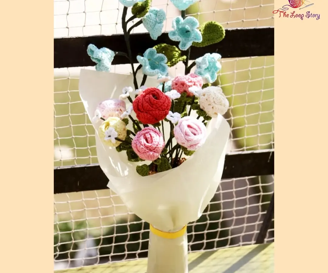 A bouquet that lasts forever. This custom crochet flower arrangement features a mix of vibrant roses and delicate blossoms, making it a perfect, everlasting gift for anniversaries, birthdays, or just because.