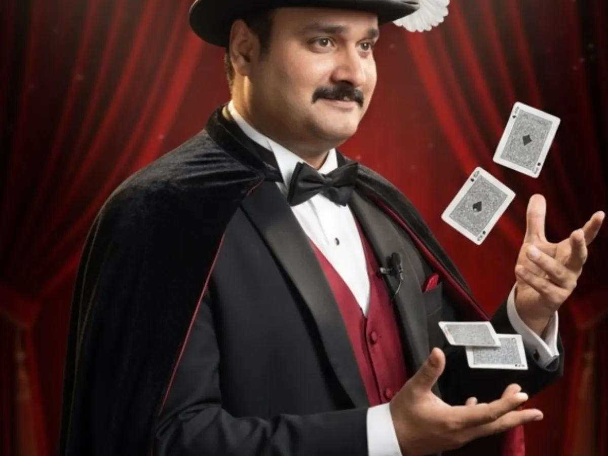 This is the classic image of a magician, and I am proud to carry on that tradition. Dressed in a top hat and cape, I perform timeless illusions, like producing a live dove, that have captivated audiences for generations.