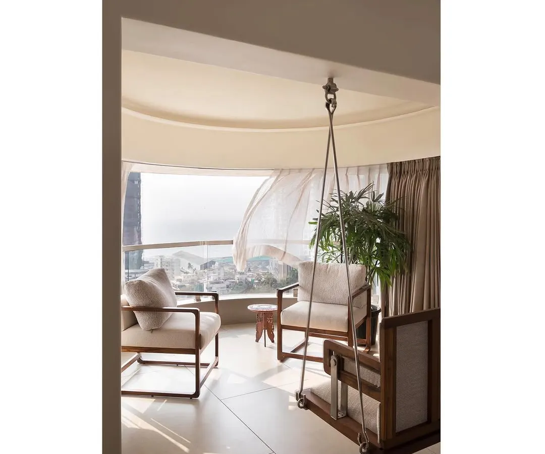 A home should be a sanctuary. For this Mumbai residence, we designed a custom bay window swing, creating a serene corner that captures the sea breeze and offers a tranquil escape from the city, demonstrating our love for maximizing views and natural light.
