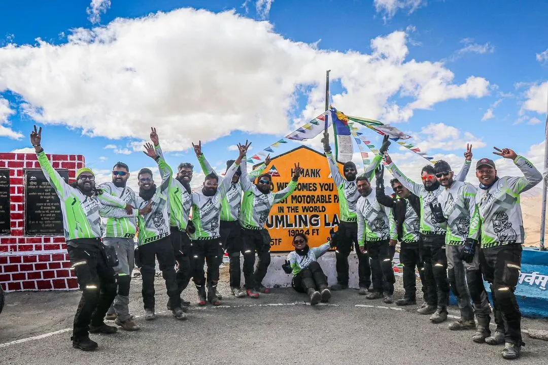 Standing on top of the world at 19,300 ft. This is our crew of 14 riders after conquering Umling La in Ladakh, the planet's highest motorable road. This is the kind of epic journey and achievement that defines the spirit of BMR.