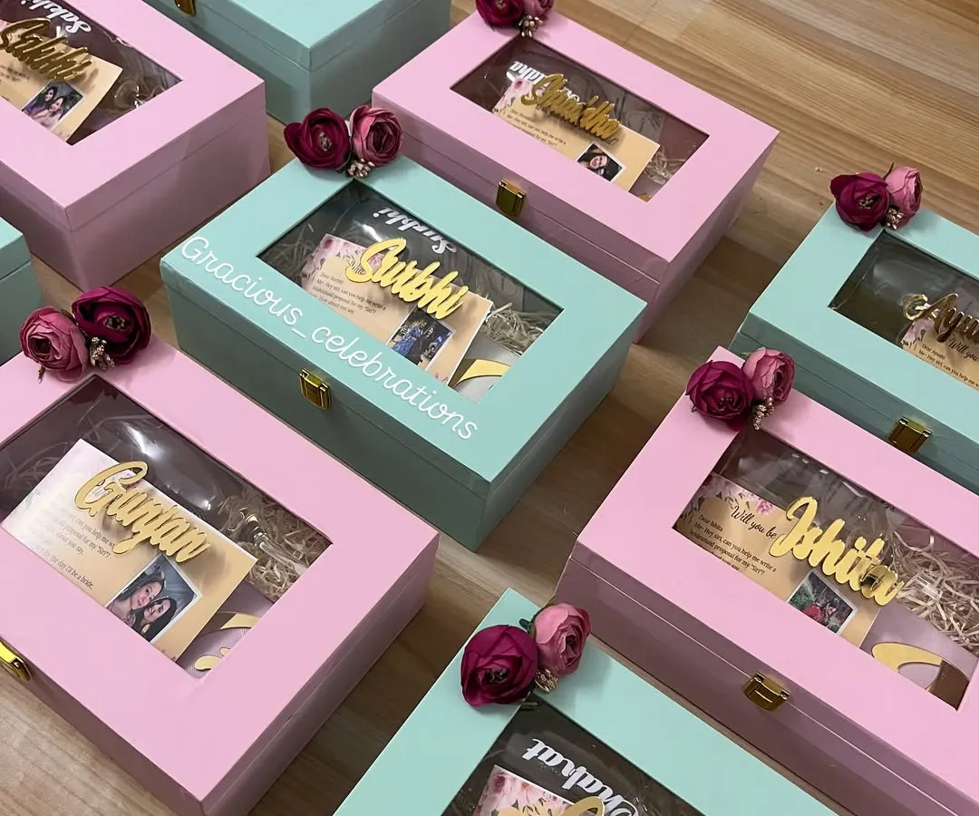 Asking your best friends to be your bridesmaids is a huge moment. I create these beautiful personalized proposal boxes in lovely pastel shades. Each box has a custom name cutout, a personal photo, and is filled with treats to show your girls how much they mean to you.