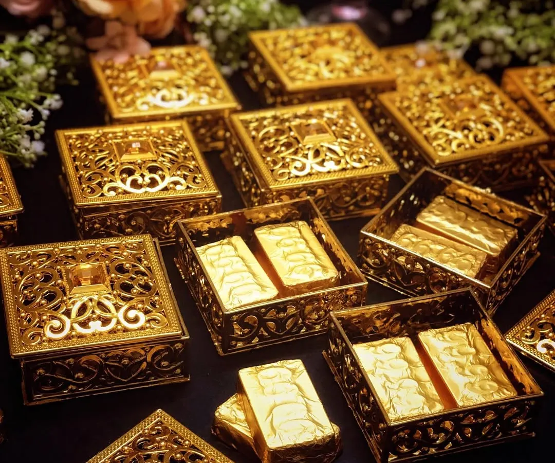 For Diwali, I offer luxurious corporate gifting solutions that feel personal and look exquisite. These ornate golden filigree boxes contain premium chocolate bars, making for an elegant and memorable gift for clients and employees.