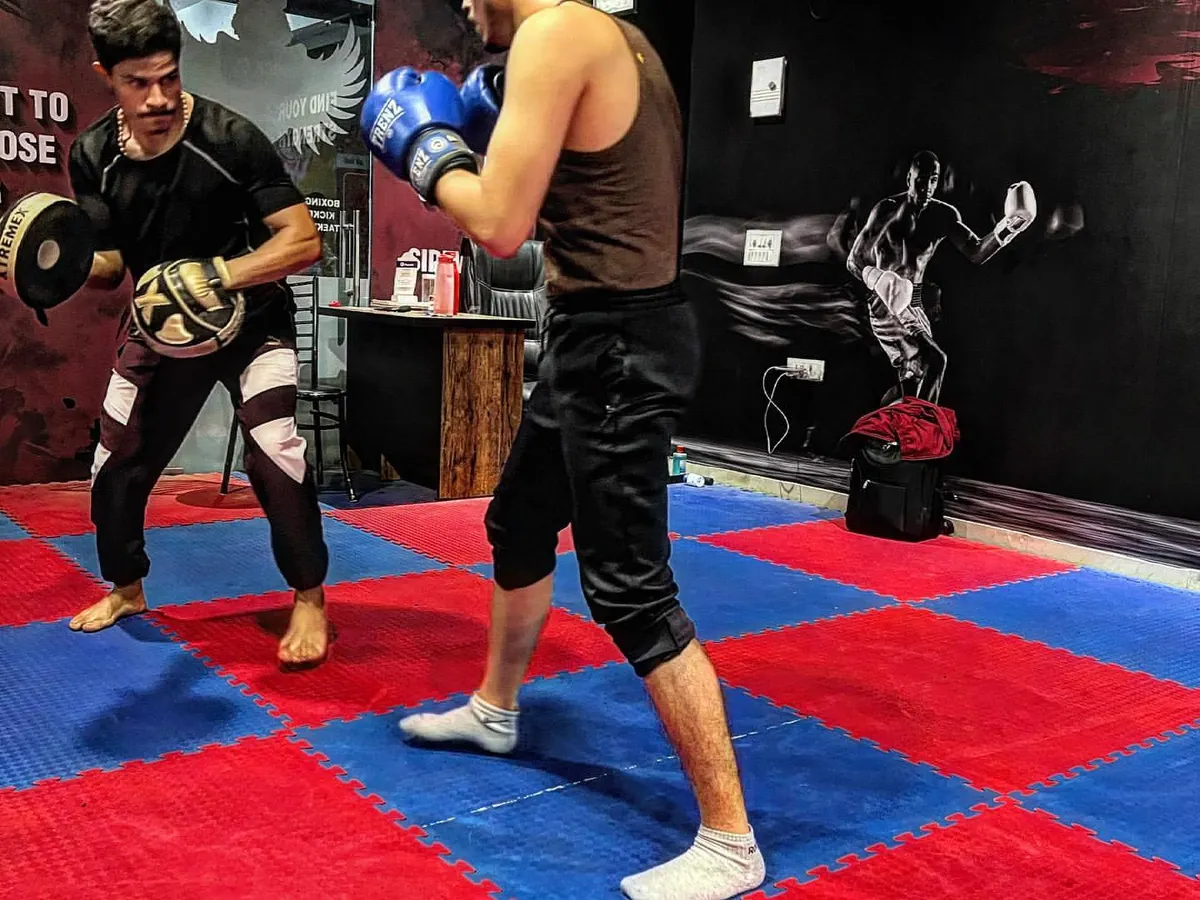 I work with you one on one to perfect your technique. During pad work sessions, we drill combinations, defense, and footwork until it becomes instinct. This is personalized coaching, not a group class.